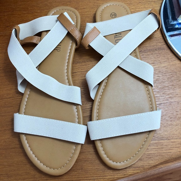 cream colored flat sandals